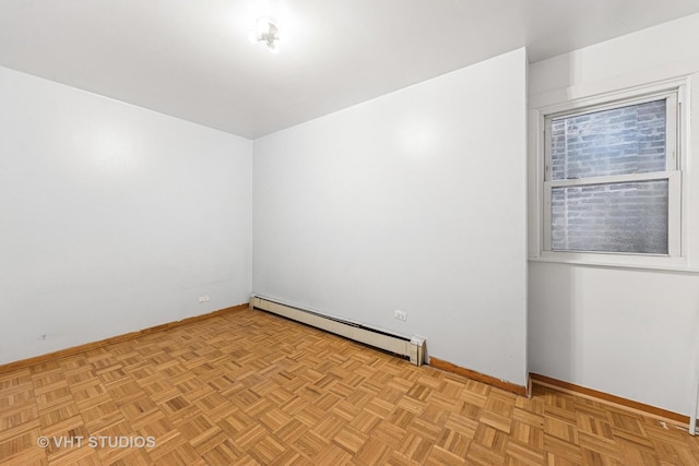 925 W 31st St, Chicago, IL 60608 - spare room featuring a baseboard heating unit and baseboards