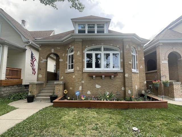 2918 N Normandy Ave, Chicago, IL 60634 - view of front of house featuring brick siding and a front yard