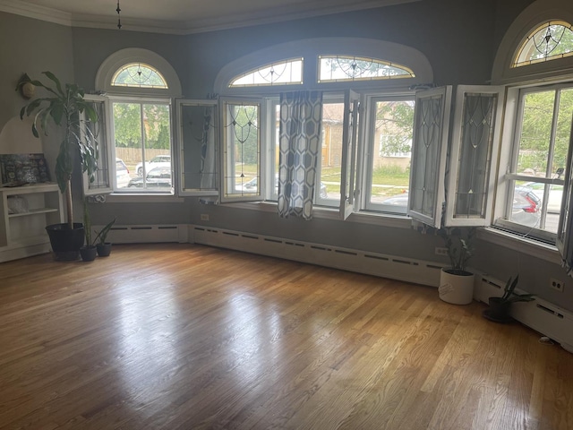 2918 N Normandy Ave, Chicago, IL 60634 - unfurnished room with crown molding and wood finished floors