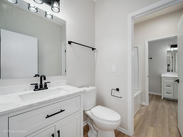 2804 River Bend Ln, Plainfield, IL 60586 - bathroom featuring vanity and wood finished floors