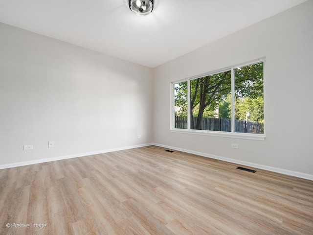 2804 River Bend Ln, Plainfield, IL 60586 - unfurnished room with light wood-type flooring and baseboards