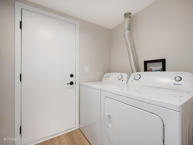 2804 River Bend Ln, Plainfield, IL 60586 - washroom featuring washer and dryer and light wood-style floors