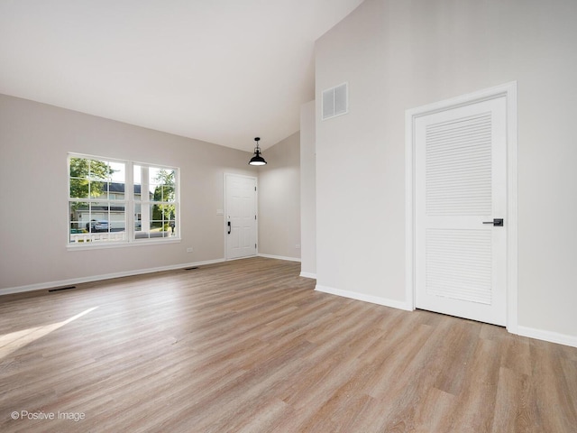 2804 River Bend Ln, Plainfield, IL 60586 - spare room with light wood-style floors and high vaulted ceiling
