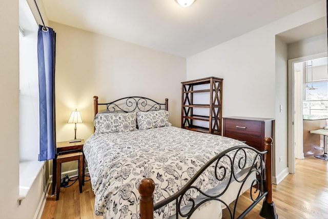 3005 N Clifton Ave Unit 201, Chicago, IL 60657 - bedroom with light wood-type flooring and baseboards
