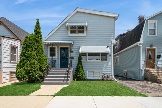 3131 N Odell Ave, Chicago, IL 60707 - view of front of house featuring a front lawn and entry steps