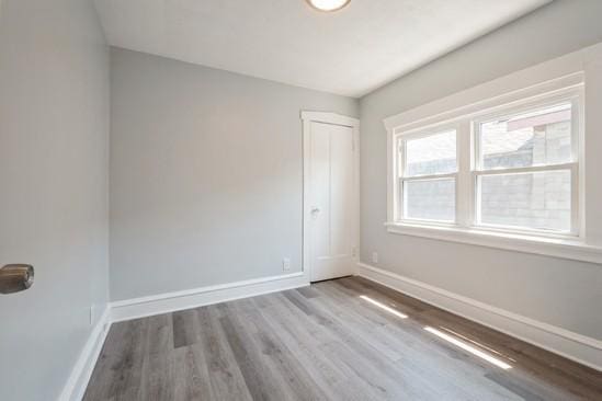 3131 N Odell Ave, Chicago, IL 60707 - empty room featuring baseboards and wood finished floors