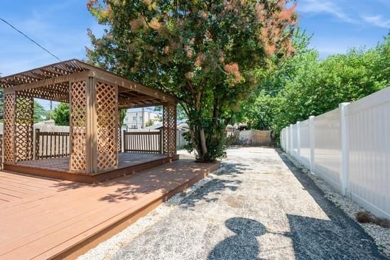 3131 N Odell Ave, Chicago, IL 60707 - fenced backyard with a wooden deck and a gazebo