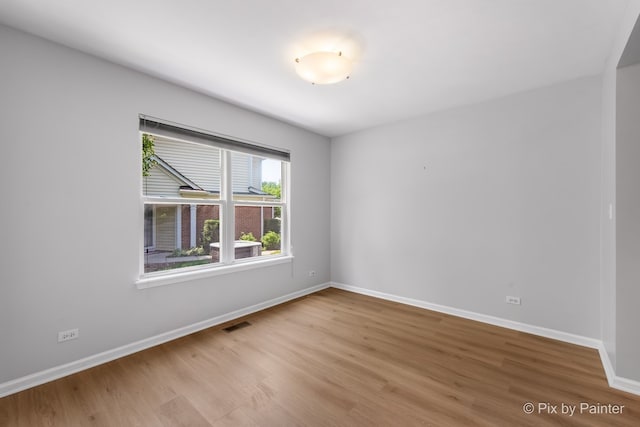1521 E Baronet Ln, Palatine, IL 60074 - unfurnished room with wood finished floors