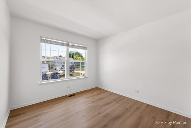 1521 E Baronet Ln, Palatine, IL 60074 - empty room with wood finished floors