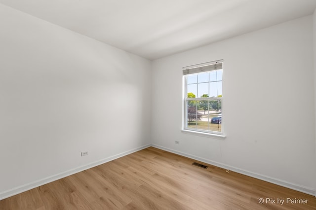 1521 E Baronet Ln, Palatine, IL 60074 - unfurnished room featuring light wood-type flooring and baseboards
