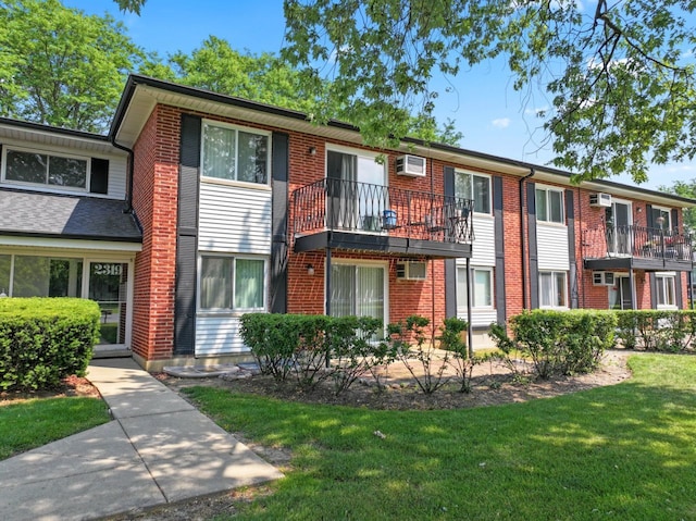 2319 E Olive St Unit 1D, Arlington Heights, IL 60004 - view of building exterior with a wall mounted AC