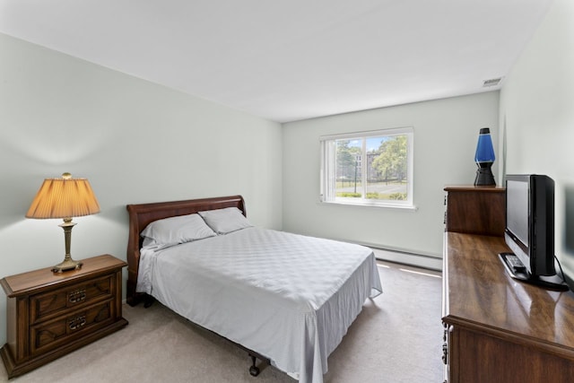 2319 E Olive St Unit 1D, Arlington Heights, IL 60004 - carpeted bedroom featuring a baseboard heating unit