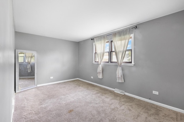 225 S Willow St, Glenwood, IL 60425 - spare room with carpet floors