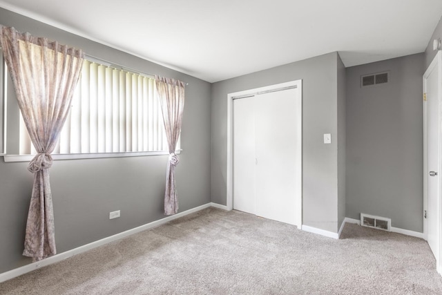 225 S Willow St, Glenwood, IL 60425 - unfurnished bedroom with carpet and a closet