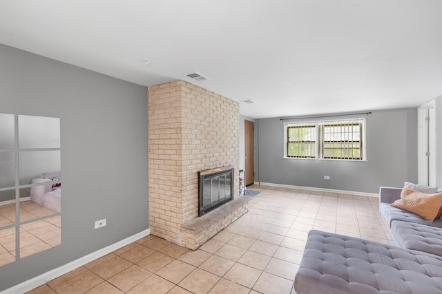 225 S Willow St, Glenwood, IL 60425 - living area featuring light tile patterned flooring and a brick fireplace