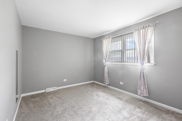 225 S Willow St, Glenwood, IL 60425 - carpeted empty room featuring baseboards
