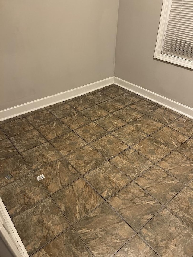 8005 S Blackstone Ave, Chicago, IL 60619 - unfurnished room with baseboards