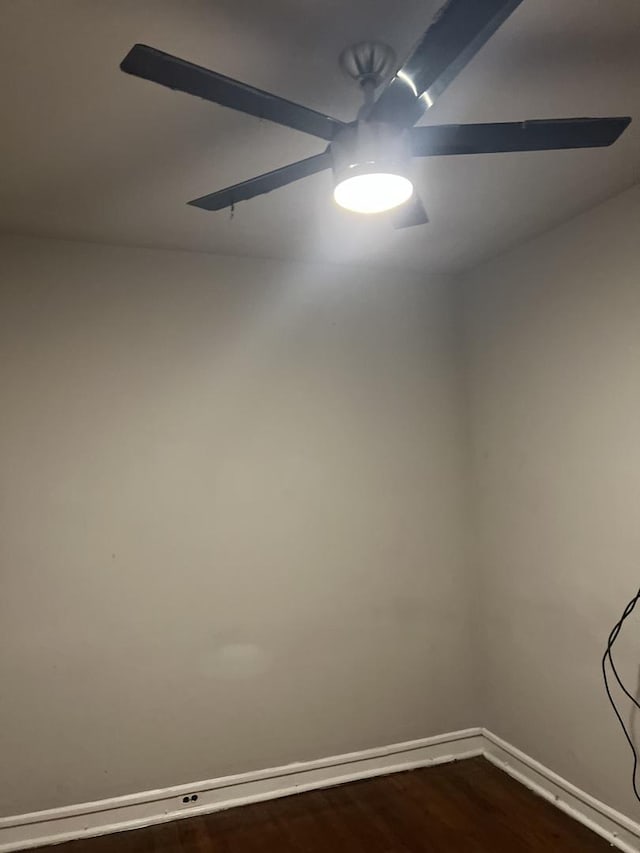 8005 S Blackstone Ave, Chicago, IL 60619 - unfurnished room featuring baseboards and dark wood-type flooring