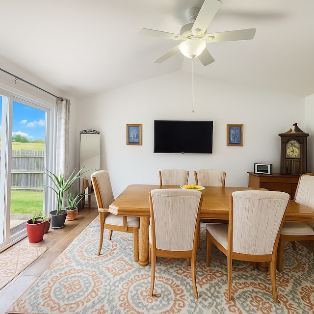 72 Wilton Ln, Mundelein, IL 60060 - dining area with lofted ceiling, light wood finished floors, and a ceiling fan