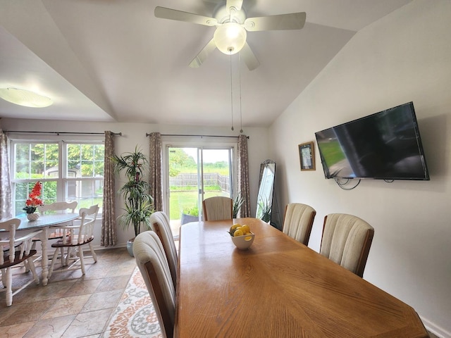 72 Wilton Ln, Mundelein, IL 60060 - dining area with lofted ceiling, stone tile flooring, and ceiling fan