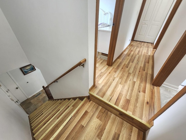 72 Wilton Ln, Mundelein, IL 60060 - stairs featuring wood finished floors and baseboards