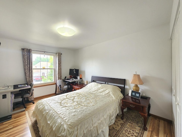 72 Wilton Ln, Mundelein, IL 60060 - bedroom with light wood finished floors and a desk
