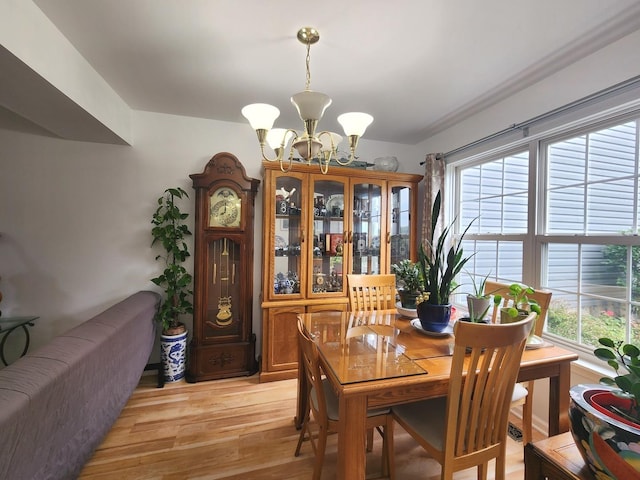 72 Wilton Ln, Mundelein, IL 60060 - dining space with a chandelier and light wood-style flooring