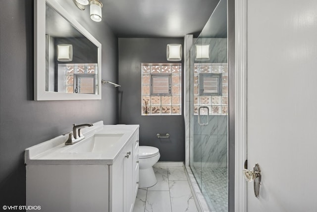3012 N Nottingham Ave, Chicago, IL 60634 - bathroom featuring healthy amount of natural light, vanity, marble look tiles, and a stall shower