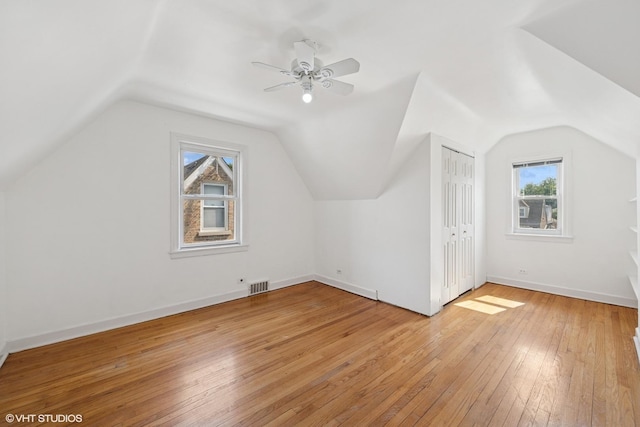 3012 N Nottingham Ave, Chicago, IL 60634 - additional living space featuring light wood finished floors, vaulted ceiling, and a ceiling fan