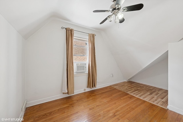 3012 N Nottingham Ave, Chicago, IL 60634 - bonus room with light wood-style flooring, lofted ceiling, ceiling fan, and cooling unit
