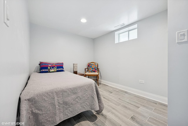 3012 N Nottingham Ave, Chicago, IL 60634 - bedroom with light wood finished floors and recessed lighting