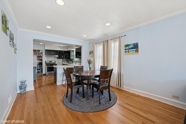 3012 N Nottingham Ave, Chicago, IL 60634 - dining space with ornamental molding, light wood-type flooring, and recessed lighting