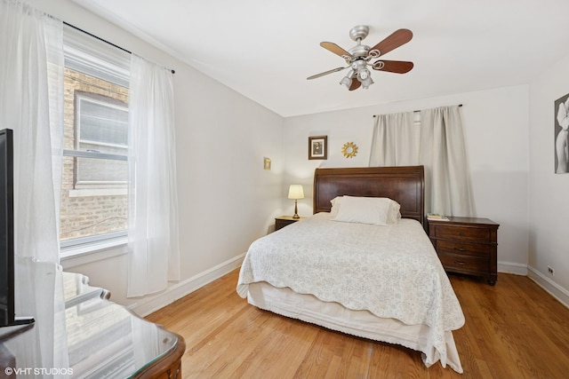 3012 N Nottingham Ave, Chicago, IL 60634 - bedroom featuring wood finished floors and a ceiling fan