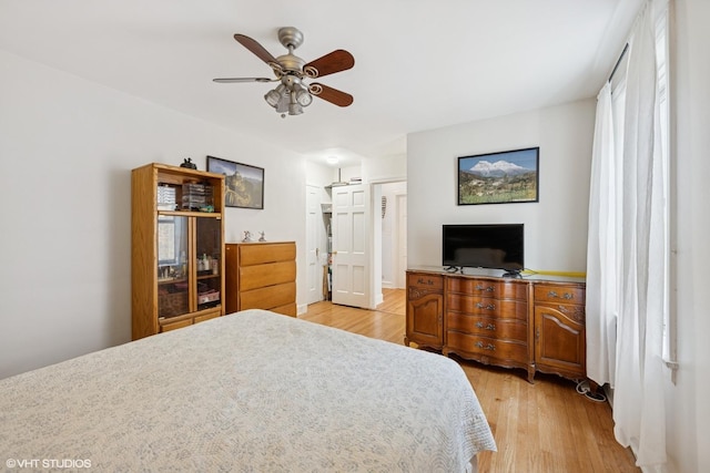 3012 N Nottingham Ave, Chicago, IL 60634 - bedroom featuring light wood finished floors and ceiling fan