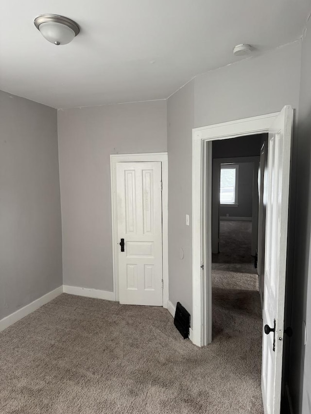 118 Wilcox Ave, Elgin, IL 60123 - empty room featuring carpet flooring and a smoke detector
