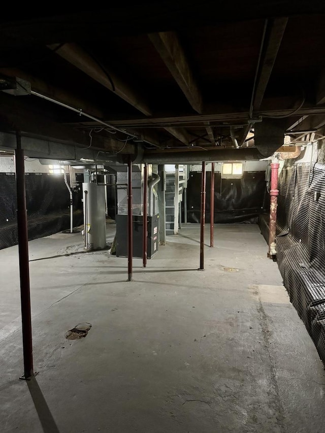 118 Wilcox Ave, Elgin, IL 60123 - unfinished basement featuring gas water heater and heating unit