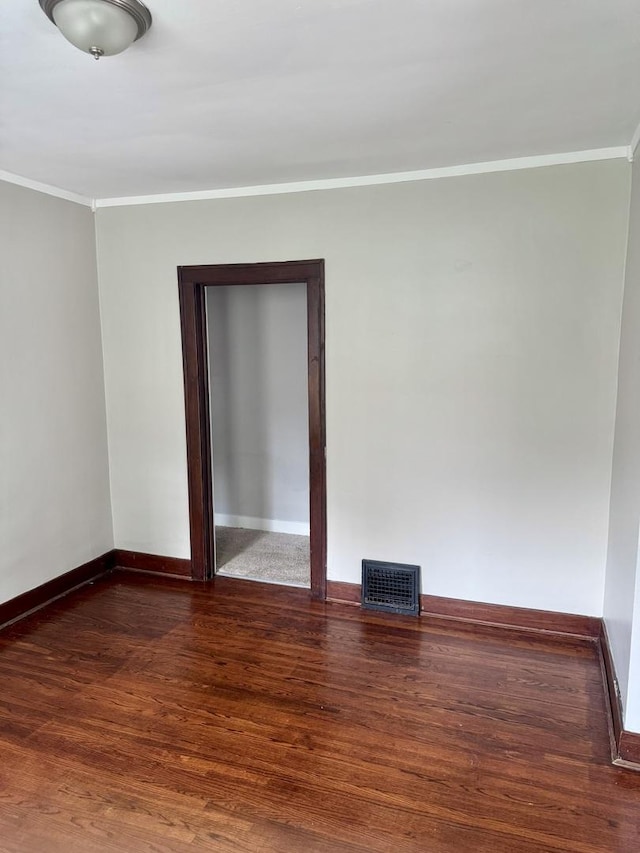 118 Wilcox Ave, Elgin, IL 60123 - unfurnished room with ornamental molding and wood finished floors