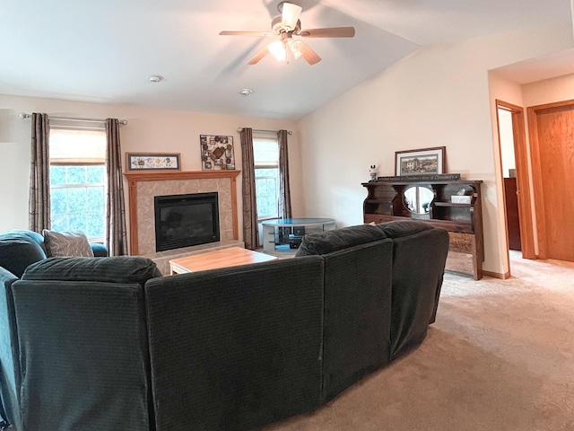 967 Brown Dr, Momence, IL 60954 - living area with light colored carpet, ceiling fan, a tiled fireplace, and lofted ceiling
