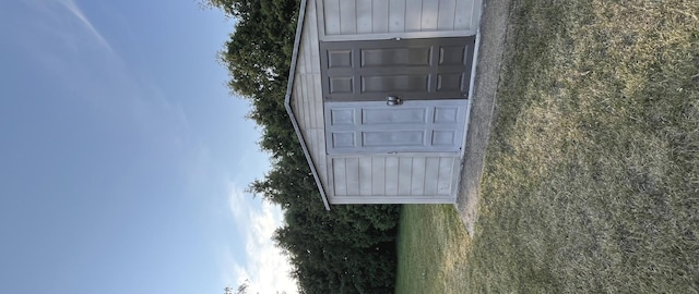 967 Brown Dr, Momence, IL 60954 - doorway to property featuring board and batten siding