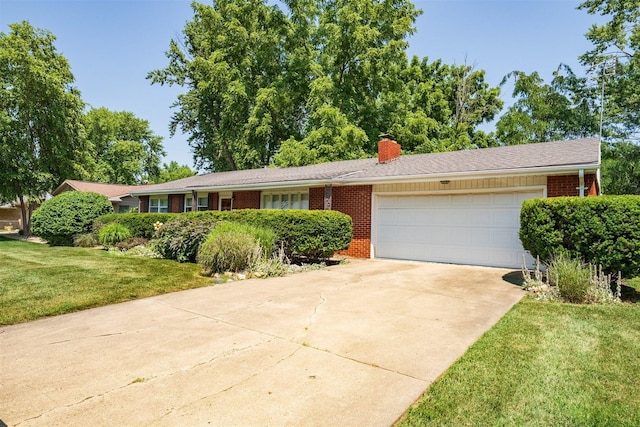 14 Grandview Dr, Normal, IL 61761 - ranch-style home featuring a chimney, a garage, brick siding, driveway, and a front lawn