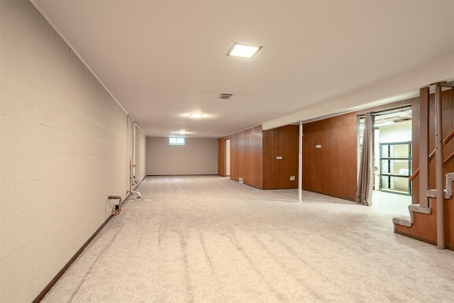 14 Grandview Dr, Normal, IL 61761 - basement featuring stairway, light colored carpet, and concrete block wall