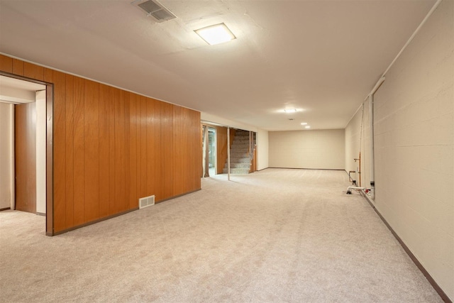 14 Grandview Dr, Normal, IL 61761 - finished below grade area featuring carpet, wood walls, and stairway