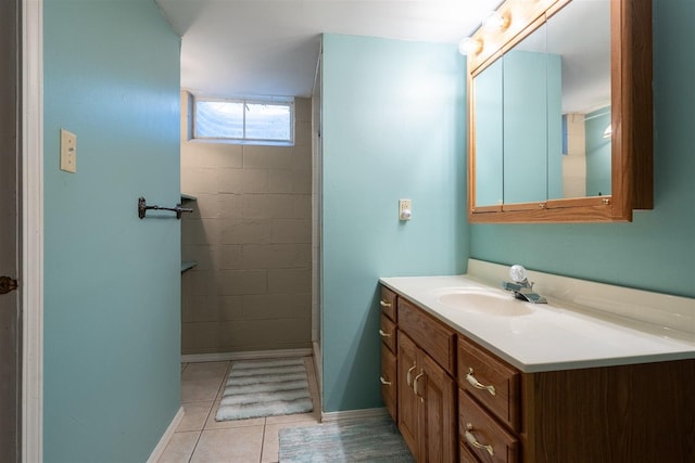 14 Grandview Dr, Normal, IL 61761 - bathroom featuring vanity, tile patterned flooring, and tiled shower