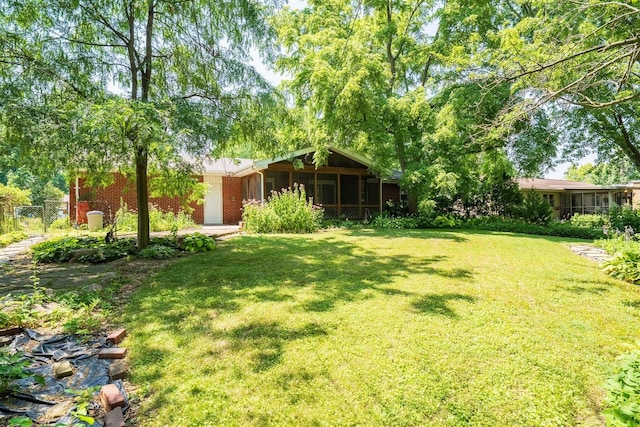 14 Grandview Dr, Normal, IL 61761 - view of yard featuring a sunroom