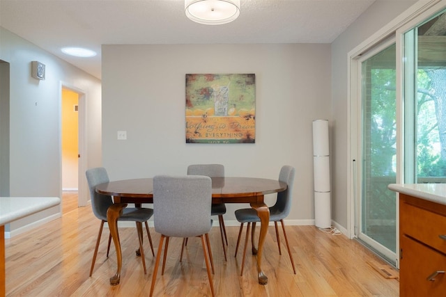 14 Grandview Dr, Normal, IL 61761 - dining area featuring light wood finished floors and baseboards