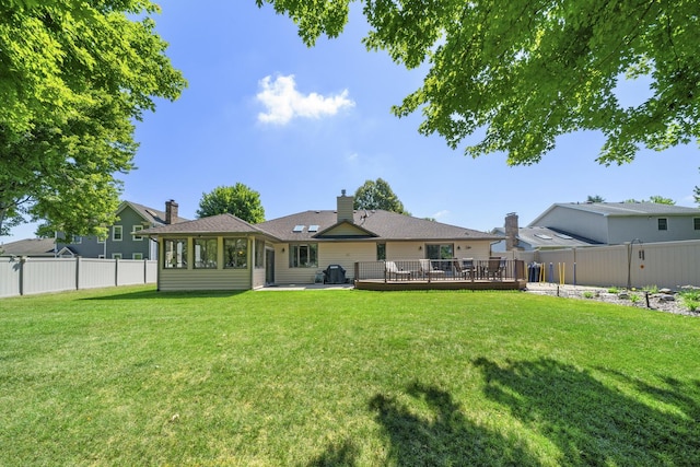 541 Donald St, Hinckley, IL 60520 - back of property with a fenced backyard, a wooden deck, a chimney, and a patio