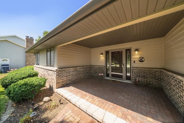 541 Donald St, Hinckley, IL 60520 - entrance to property featuring brick siding and a patio area