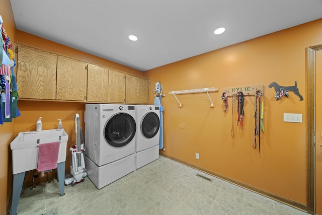 541 Donald St, Hinckley, IL 60520 - laundry area with washing machine and clothes dryer, cabinet space, and recessed lighting