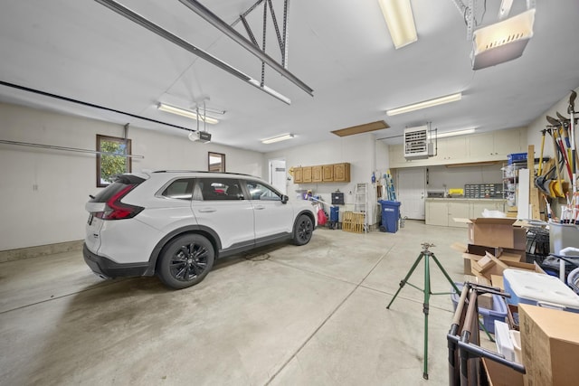 541 Donald St, Hinckley, IL 60520 - garage with a garage door opener and a heating unit