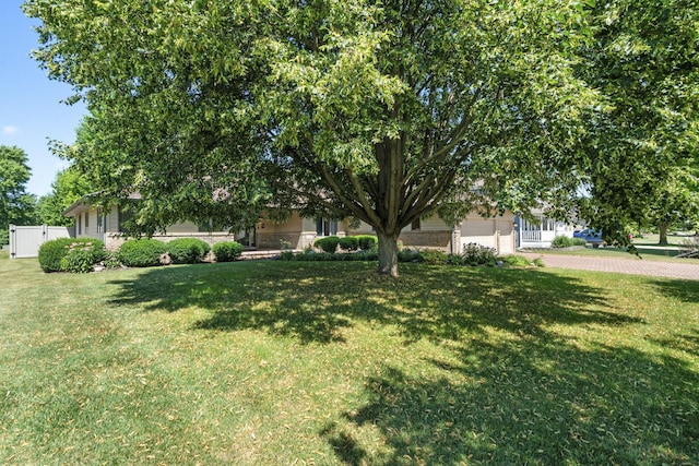 541 Donald St, Hinckley, IL 60520 - view of front facade featuring an attached garage